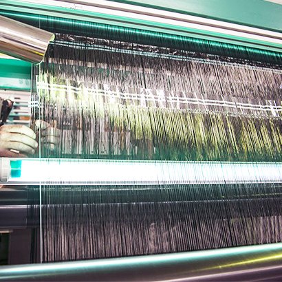 Ajustement sur machine textile