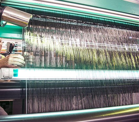 Ajustement sur machine textile