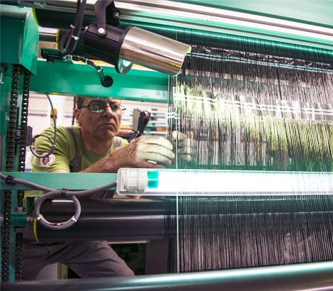 Ajustement sur machine textile